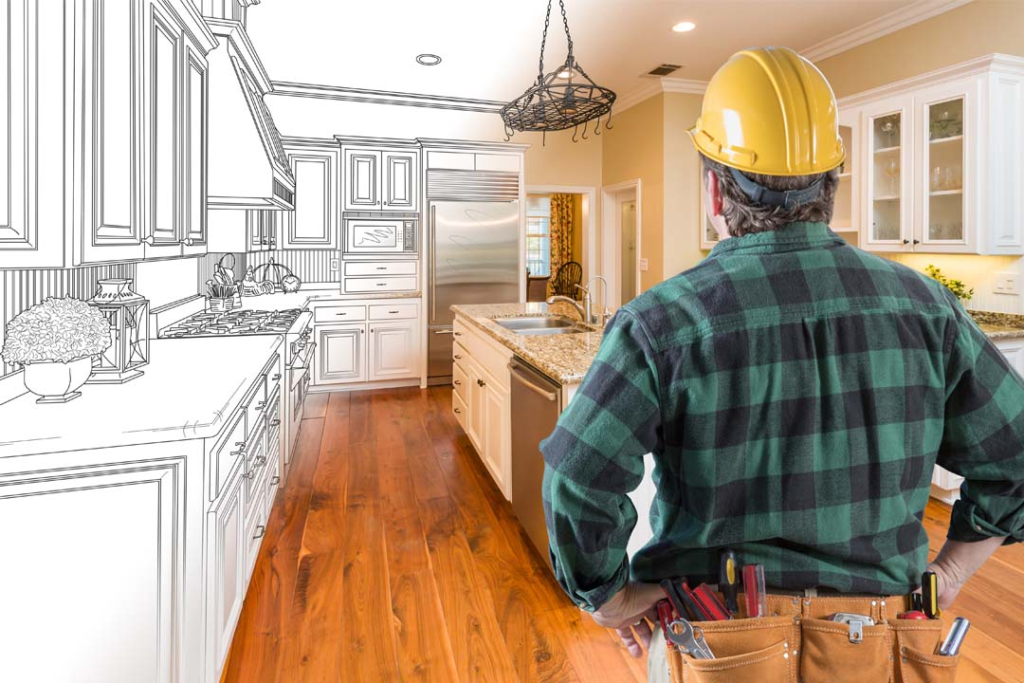 Homeowner meeting with a full-service kitchen contractor for kitchen renovation planning in the GTA